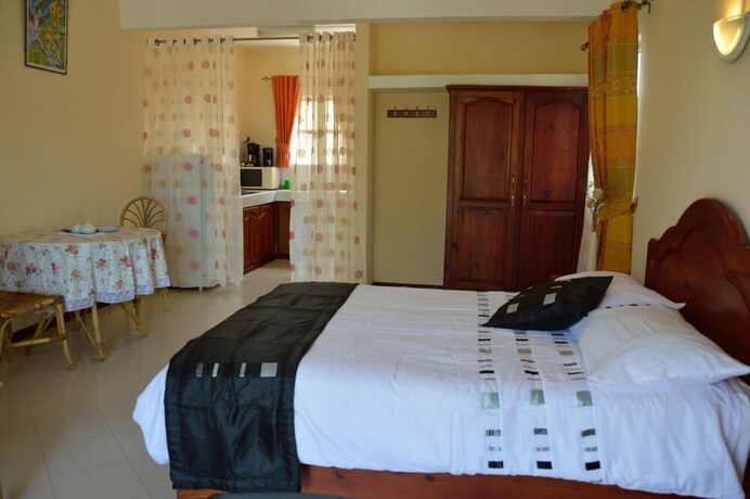 Imagen de la habitación del Le Capricorne Villas. Foto 18