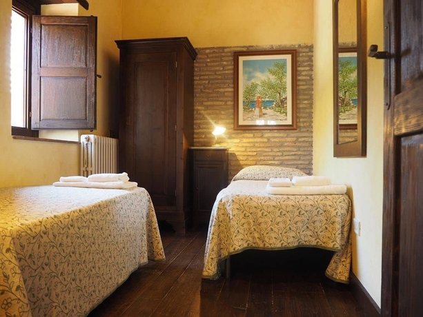 Imagen de la habitación del Le Cisterne Dell'etna. Foto 7