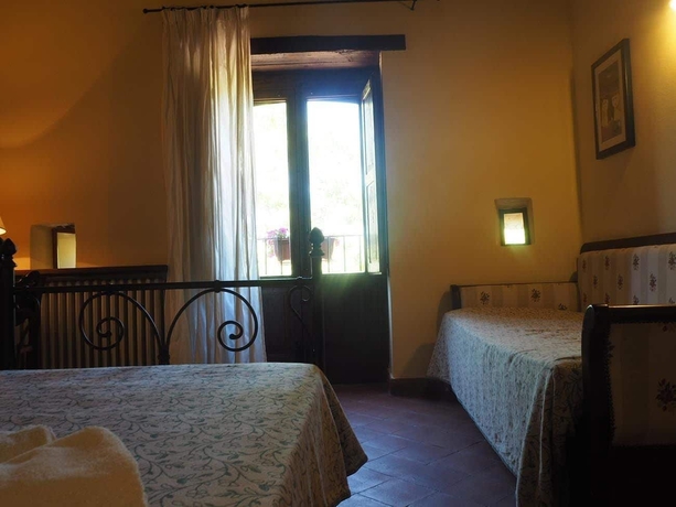 Imagen de la habitación del Le Cisterne Dell'etna. Foto 11