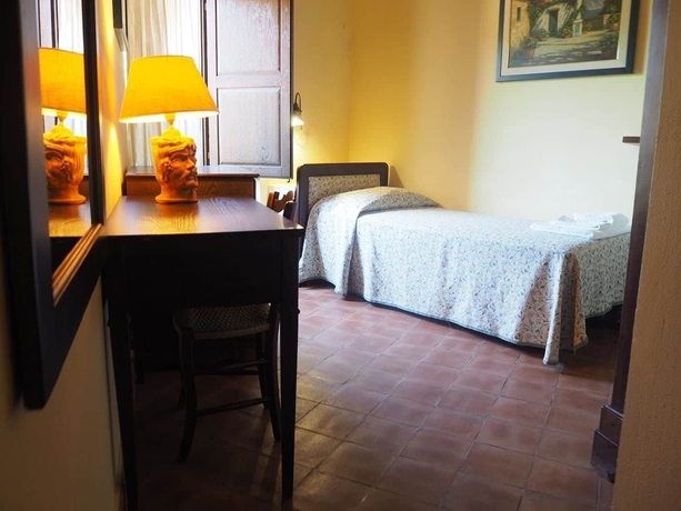 Imagen de la habitación del Le Cisterne Dell'etna. Foto 12