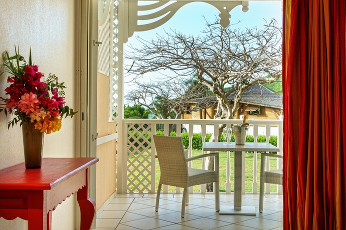 Imagen de la habitación del Le Domaine Anse Marcel Beach Resort. Foto 7