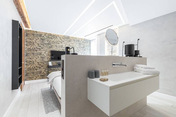 Imagen de la habitación del Le Dortoir Boutique Suites. Foto 5