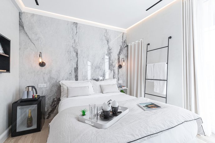 Imagen de la habitación del Le Dortoir Boutique Suites. Foto 9