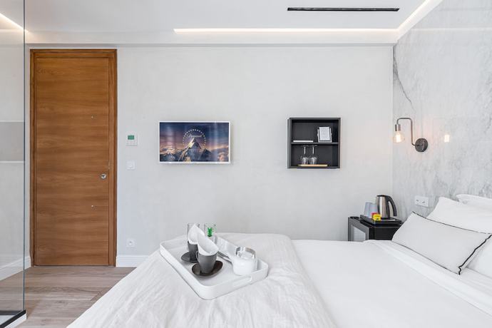 Imagen de la habitación del Le Dortoir Boutique Suites. Foto 12