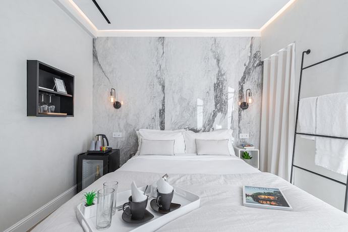 Imagen de la habitación del Le Dortoir Boutique Suites. Foto 14