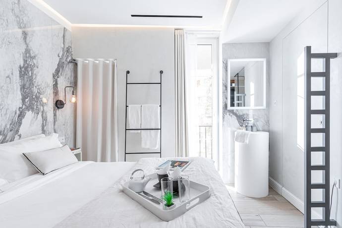 Imagen de la habitación del Le Dortoir Boutique Suites. Foto 19