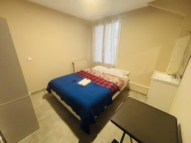 Imagen de la habitación del Le Grand Caf&eacute;. Foto 11