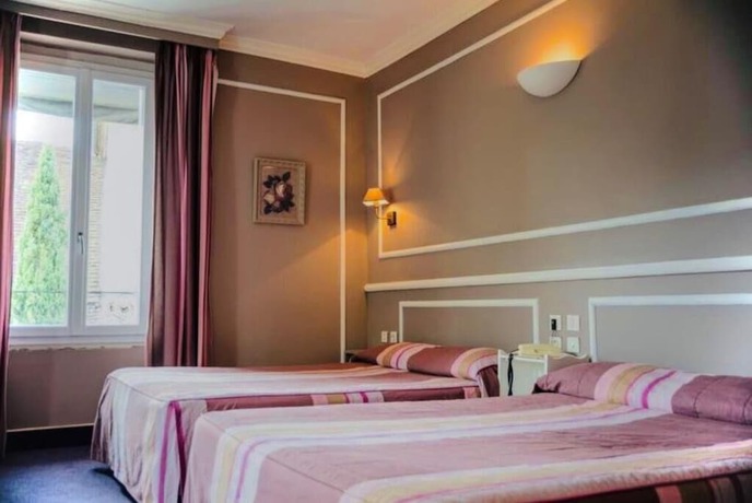 Imagen de la habitación del Le Grand H&ocirc;tel, SOUILLAC. Foto 5