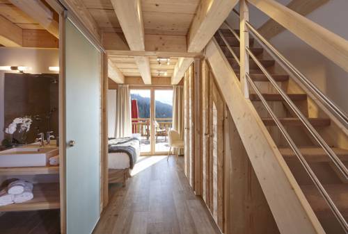 Imagen de la habitación del Le Lodge Chasse Montagne. Foto 8