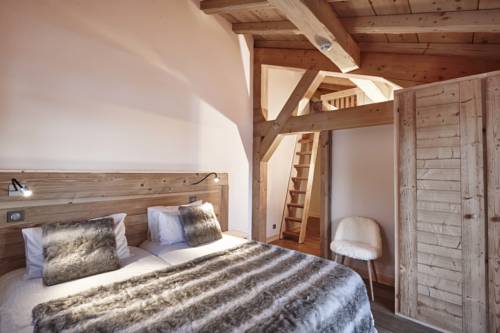 Imagen de la habitación del Le Lodge Chasse Montagne. Foto 9