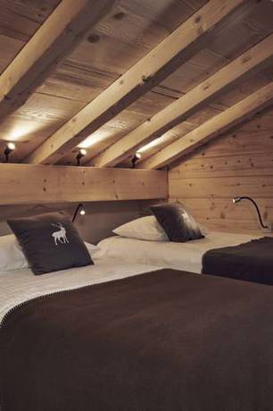 Imagen de la habitación del Le Lodge Chasse Montagne. Foto 12