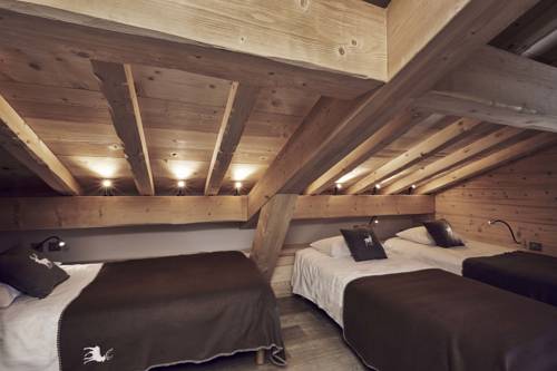 Imagen de la habitación del Le Lodge Chasse Montagne. Foto 13