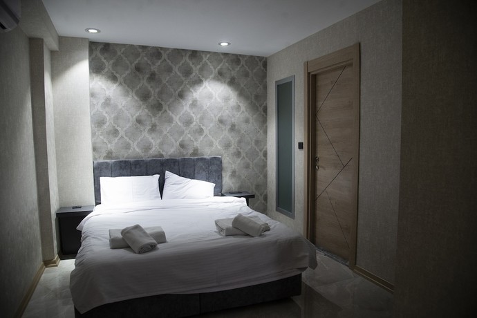 Imagen de la habitación del Le Luxe suites hotel and SPA. Foto 5