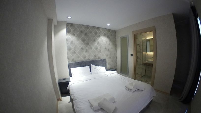 Imagen de la habitación del Le Luxe suites hotel and SPA. Foto 6