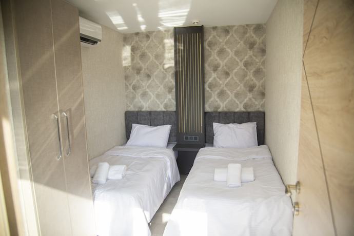Imagen de la habitación del Le Luxe suites hotel and SPA. Foto 8