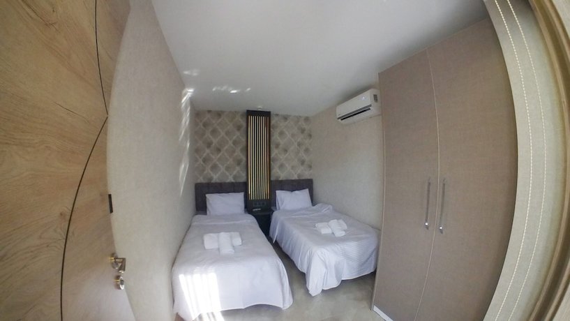 Imagen de la habitación del Le Luxe suites hotel and SPA. Foto 9