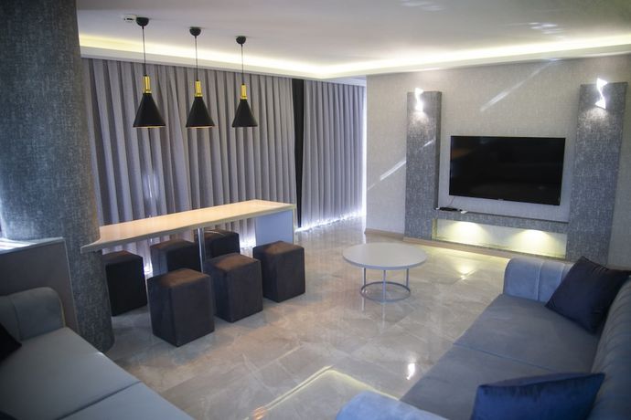 Imagen de la habitación del Le Luxe suites hotel and SPA. Foto 11