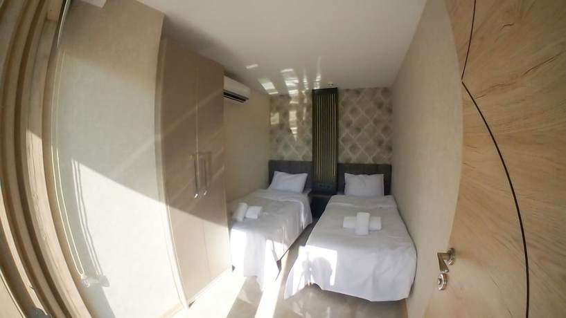 Imagen de la habitación del Le Luxe suites hotel and SPA. Foto 12