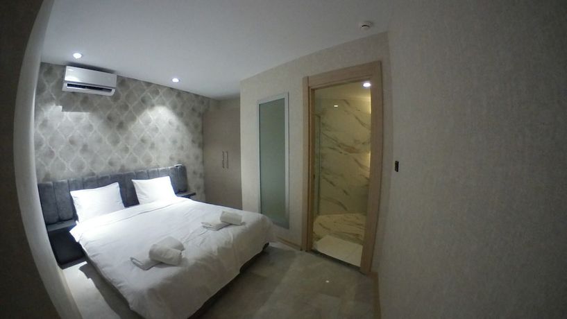 Imagen de la habitación del Le Luxe suites hotel and SPA. Foto 13