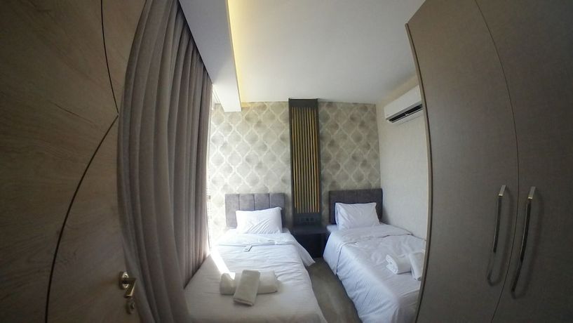 Imagen de la habitación del Le Luxe suites hotel and SPA. Foto 14