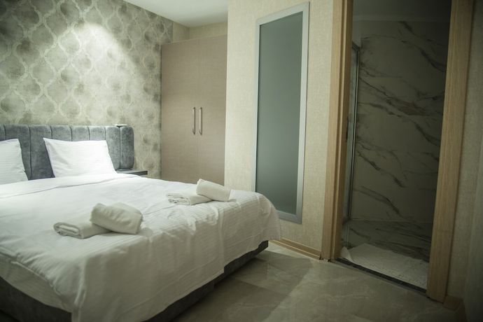 Imagen de la habitación del Le Luxe suites hotel and SPA. Foto 16