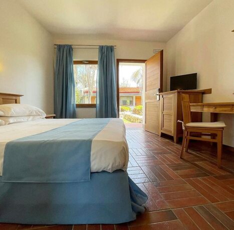 Imagen de la habitación del Le Mandrelle Beach Resort. Foto 17