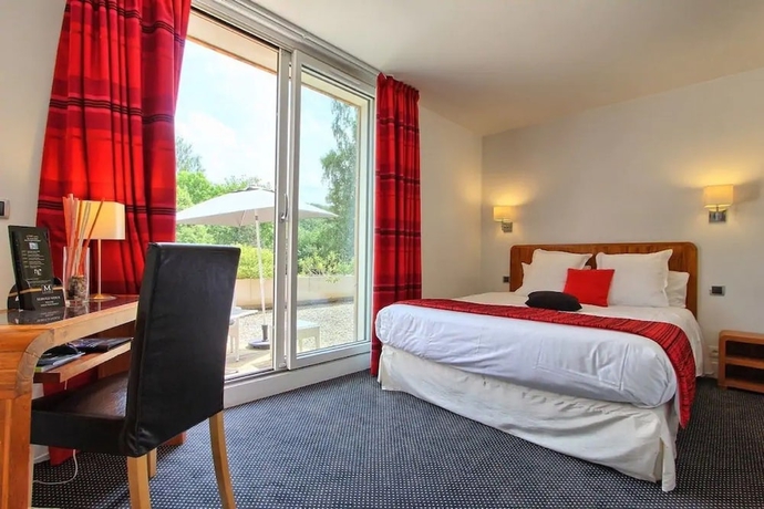Imagen de la habitación del Le Manoir De Sauvegrain. Foto 17