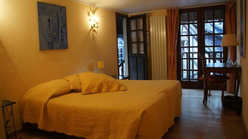 Imagen de la habitación del Le Moulin d\'Andé. Foto 13