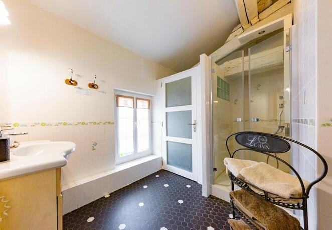 Imagen de la habitación del Le Moulin de Rudelle. Foto 16