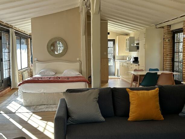 Imagen de la habitación del Le Moulin de Rudelle. Foto 18