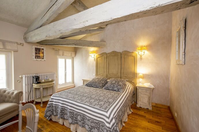 Imagen de la habitación del Le Moulin de Rudelle. Foto 19