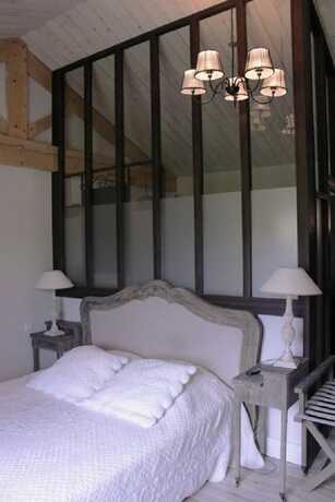 Imagen de la habitación del Le Moulin de la Fortie. Foto 18