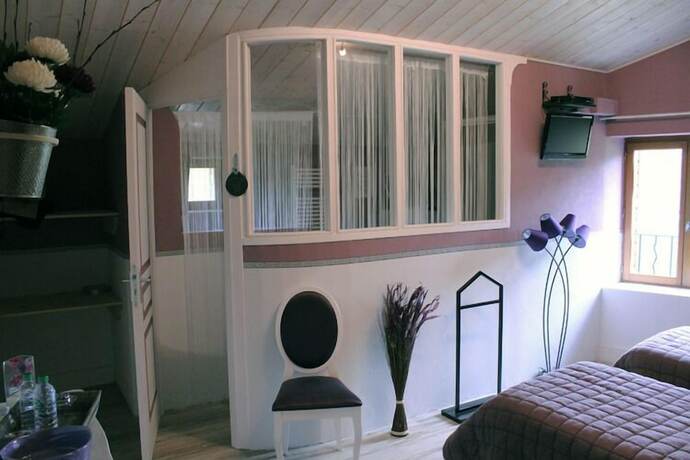 Imagen de la habitación del Le Moulin de la Fortie. Foto 19