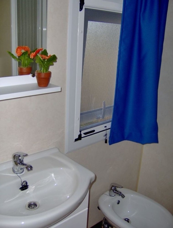 Imagen de la habitación del Le Palme Village. Foto 4