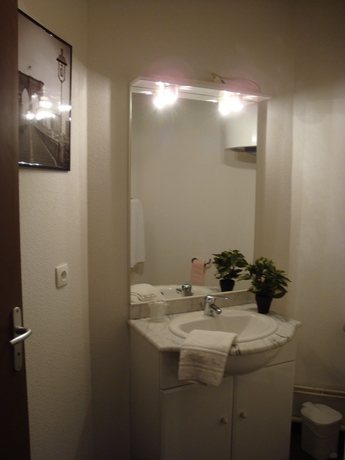 Imagen de la habitación del Le Patio des traboules. Foto 15