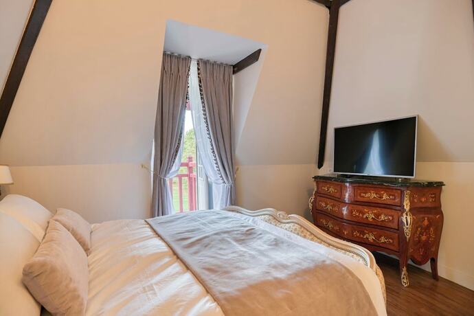 Imagen de la habitación del Le Petit Ch&acirc;teau De Barbizon. Foto 11