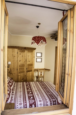 Imagen de la habitación del Le Petit Fenestrelle. Foto 7