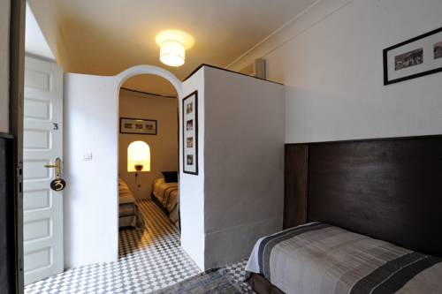 Imagen de la habitación del Le Petit H&ocirc;tel Du Flouka. Foto 7