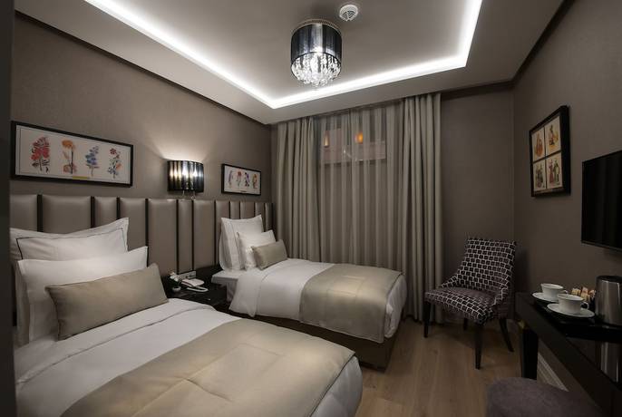 Imagen de la habitación del Le Petit Palace Hotel. Foto 4