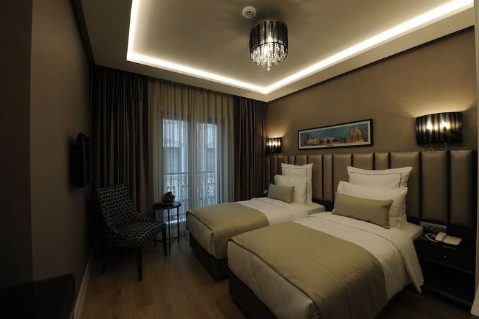 Imagen de la habitación del Le Petit Palace Hotel. Foto 5