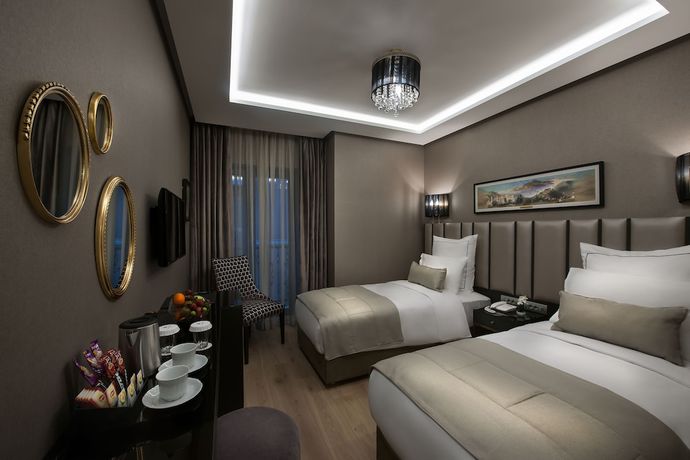 Imagen de la habitación del Le Petit Palace Hotel. Foto 12