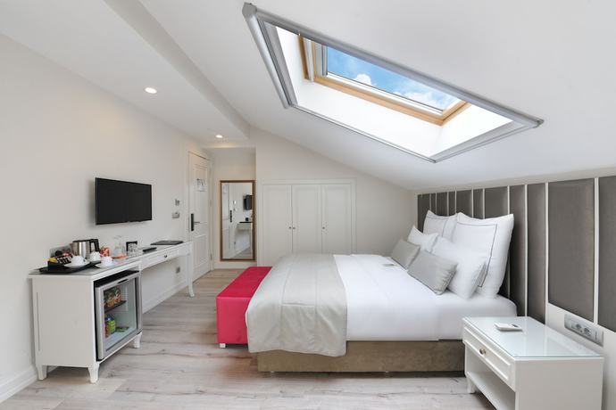 Imagen de la habitación del Le Petit Palace Hotel. Foto 16