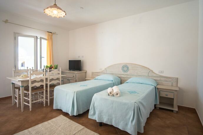 Imagen de la habitación del Le Residenze del Golfo di Orosei. Foto 15