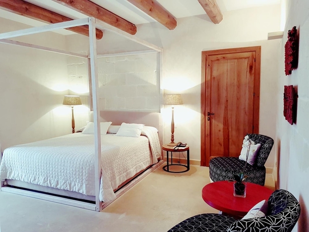 Imagen de la habitación del Le Scuderie - Castello Monaci. Foto 7