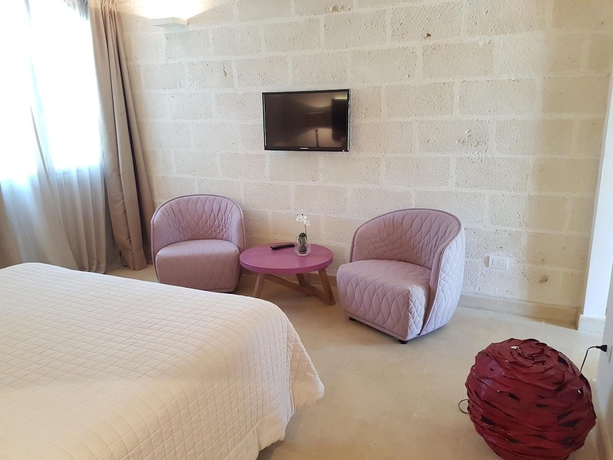 Imagen de la habitación del Le Scuderie - Castello Monaci. Foto 8