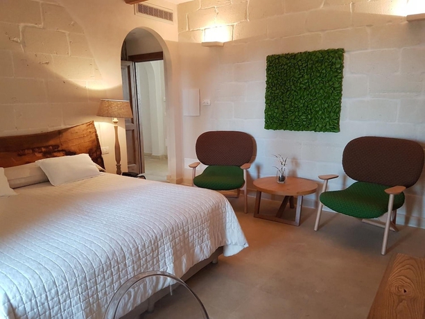 Imagen de la habitación del Le Scuderie - Castello Monaci. Foto 10