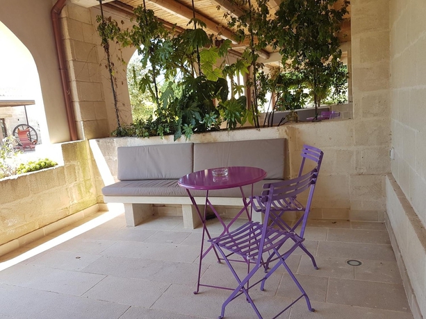 Imagen de la habitación del Le Scuderie - Castello Monaci. Foto 15