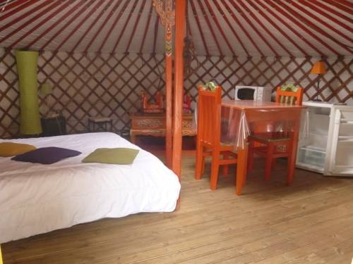 Imagen de la habitación del Le Village De Yourtes. Foto 9