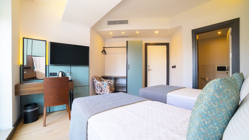 Imagen de la habitación del Leaf Port Hotel. Foto 8