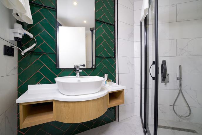 Imagen de la habitación del Leaf Port Hotel. Foto 16